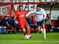 FC Twente defender Anass Salah-Eddine and Fenerbahce midfielder Irfan Can Kahveci play during the match between Twente and Fenerbahce at the...