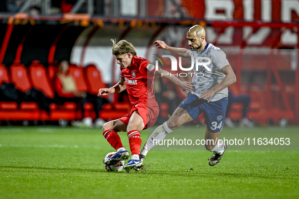 FC Twente midfielder Sem Steijn and Fenerbahce midfielder Sofyan Amrabat play during the match between Twente and Fenerbahce at the Grolsch...