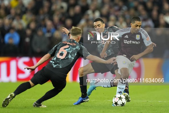 Youri Tielemans central midfield of Aston Villa and Belgium and Jamal Musiala attacking midfield of Bayern Munich and Germany compete for th...