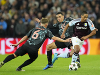 Youri Tielemans central midfield of Aston Villa and Belgium and Jamal Musiala attacking midfield of Bayern Munich and Germany compete for th...