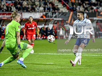 FC Twente goalkeeper Lars Unnerstall and Fenerbahce forward Dusan Tadic score to make it 1-1 during the match between Twente and Fenerbahce...