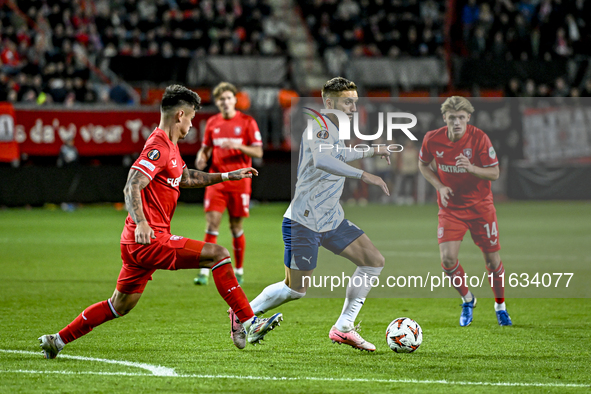 FC Twente defender Mees Hilgers and Fenerbahce forward Dusan Tadic play during the match between Twente and Fenerbahce at the Grolsch Veste...