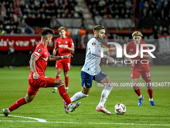 FC Twente defender Mees Hilgers and Fenerbahce forward Dusan Tadic play during the match between Twente and Fenerbahce at the Grolsch Veste...