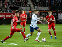 FC Twente defender Mees Hilgers and Fenerbahce forward Dusan Tadic play during the match between Twente and Fenerbahce at the Grolsch Veste...