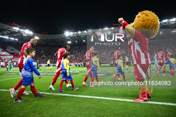 Players of Olympiacos FC enter the stadium before the Europa League, Matchday 2 match between Olympiacos FC and SC Braga at Georgios Karaisk...