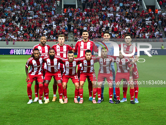 Players of Olympiacos FC stand before the Europa League Matchday 2 match between Olympiacos FC and SC Braga at Georgios Karaiskakis Stadium...