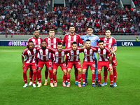 Players of Olympiacos FC stand before the Europa League Matchday 2 match between Olympiacos FC and SC Braga at Georgios Karaiskakis Stadium...