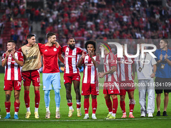 Players of Olympiacos FC celebrate the victory during the Europa League, Matchday 2 match between Olympiacos FC and SC Braga at Georgios Kar...