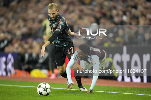 Jaden Philogene left winger of Aston Villa and England and Konrad Laimer central midfield of Bayern Munich and Austria compete for the ball...