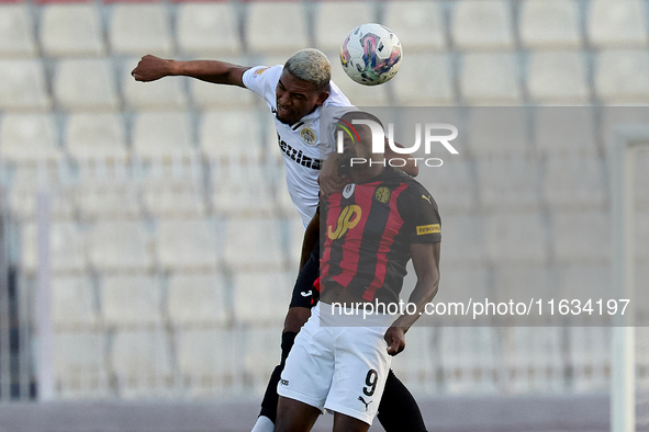 Pedro Henrique Nunes Silva of Hibernians vies for the ball with Chris Marlon Ondong Ba during the Malta 360 Sports Premier League soccer mat...