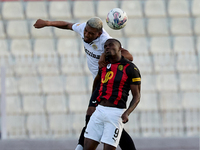 Pedro Henrique Nunes Silva of Hibernians vies for the ball with Chris Marlon Ondong Ba during the Malta 360 Sports Premier League soccer mat...