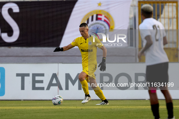 Hugo Sacco, goalkeeper of Hibernians, is in action during the Malta 360 Sports Premier League soccer match between Hamrun Spartans and Hiber...