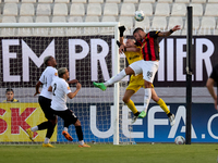 In Ta' Qali, Malta, on October 2, 2024, Hugo Sacco, the goalkeeper of Hibernians, competes for the ball with Silva Lopes Raphael of Hamrun S...