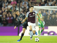 Pau Torres centre-back of Aston Villa and Spain and Jamal Musiala attacking midfield of Bayern Munich and Germany compete for the ball durin...