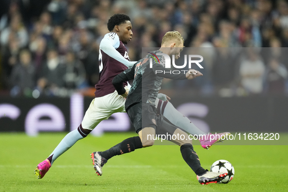 Konrad Laimer central midfield of Bayern Munich and Austria and Jaden Philogene left winger of Aston Villa and England compete for the ball...