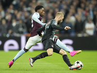 Konrad Laimer central midfield of Bayern Munich and Austria and Jaden Philogene left winger of Aston Villa and England compete for the ball...