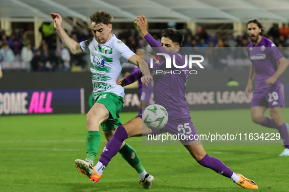 Fabiano Parisi of ACF Fiorentina and Matthew Olosunde of The New Saints ,battle for the ball during  the Conference League match between ACF...