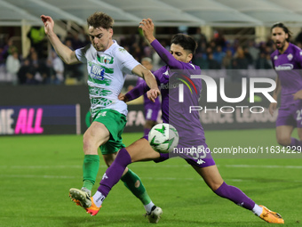 Fabiano Parisi of ACF Fiorentina and Matthew Olosunde of The New Saints ,battle for the ball during  the Conference League match between ACF...