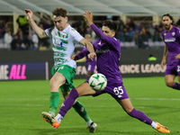 Fabiano Parisi of ACF Fiorentina and Matthew Olosunde of The New Saints ,battle for the ball during  the Conference League match between ACF...