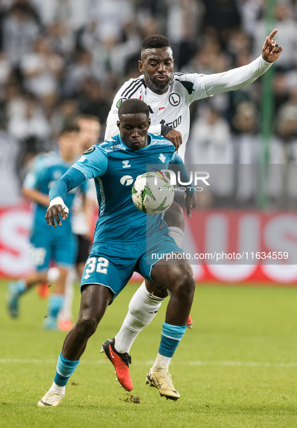 Nobel Mendy , Jean - Pierre Nsame  during UEFA Conference League match Legia Warsaw vs Real Betis in Warsaw Poland on 3 October 2024. 