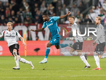 Radovan Pankov , Cedric Bakambu  during UEFA Conference League match Legia Warsaw vs Real Betis in Warsaw Poland on 3 October 2024. (