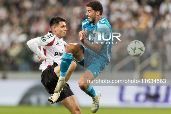 Bartosz Kapustka , Pablo Fornals  during UEFA Conference League match Legia Warsaw vs Real Betis in Warsaw Poland on 3 October 2024. 