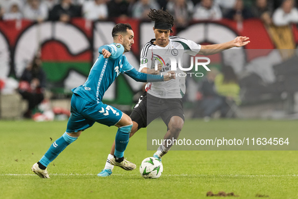 Juanmi , Maxi Oyedele  during UEFA Conference League match Legia Warsaw vs Real Betis in Warsaw Poland on 3 October 2024. 