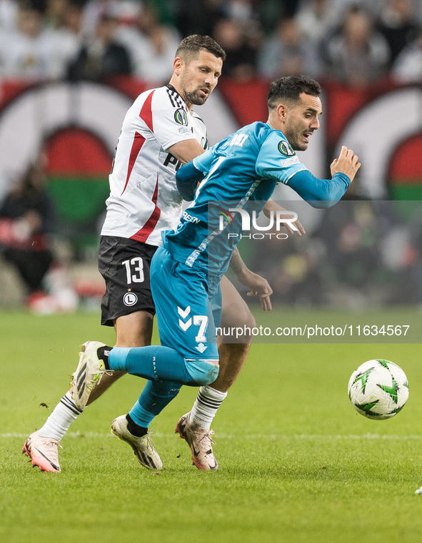 Pawel Wszolek , Juanmi  during UEFA Conference League match Legia Warsaw vs Real Betis in Warsaw Poland on 3 October 2024. 