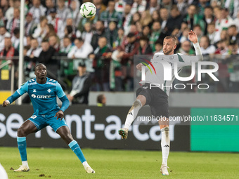 Nobel Mendy , Tomas Pekhart  during UEFA Conference League match Legia Warsaw vs Real Betis in Warsaw Poland on 3 October 2024. (