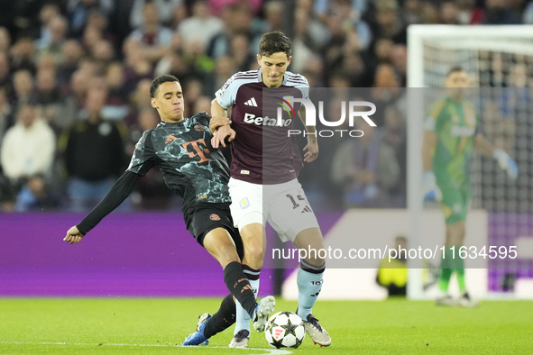 Pau Torres centre-back of Aston Villa and Spain and Jamal Musiala attacking midfield of Bayern Munich and Germany during the UEFA Champions...