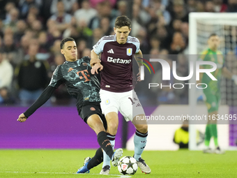 Pau Torres centre-back of Aston Villa and Spain and Jamal Musiala attacking midfield of Bayern Munich and Germany during the UEFA Champions...