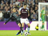 Pau Torres centre-back of Aston Villa and Spain and Jamal Musiala attacking midfield of Bayern Munich and Germany during the UEFA Champions...