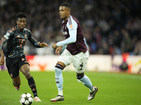 Ezri Konsa centre-back of Aston Villa and England and Kingsley Coman left winger of Bayern Munich and Francecompete for the ball during the...