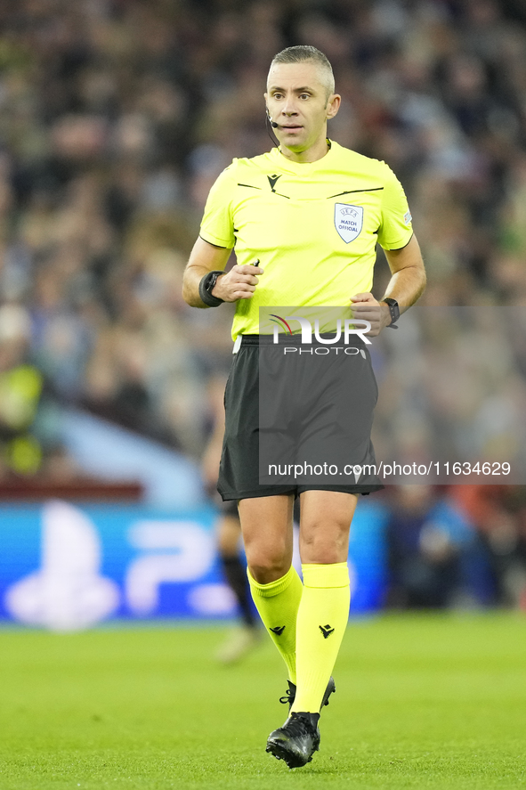 Referee Radu Petrescu during the UEFA Champions League 2024/25 League Phase MD2 match between Aston Villa FC and FC Bayern Munchen at Villa...