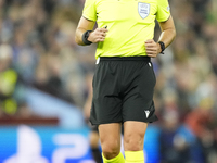 Referee Radu Petrescu during the UEFA Champions League 2024/25 League Phase MD2 match between Aston Villa FC and FC Bayern Munchen at Villa...