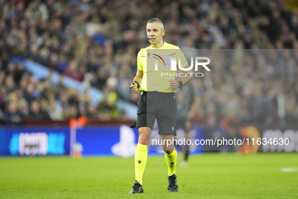 Referee Radu Petrescu during the UEFA Champions League 2024/25 League Phase MD2 match between Aston Villa FC and FC Bayern Munchen at Villa...