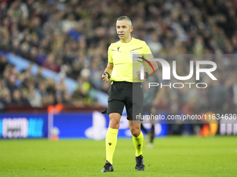 Referee Radu Petrescu during the UEFA Champions League 2024/25 League Phase MD2 match between Aston Villa FC and FC Bayern Munchen at Villa...