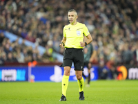 Referee Radu Petrescu during the UEFA Champions League 2024/25 League Phase MD2 match between Aston Villa FC and FC Bayern Munchen at Villa...