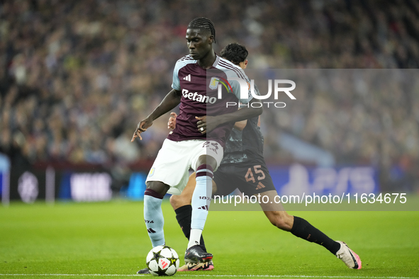 Amadou Onana defensive midfield of Aston Villa and Belgium and Aleksandar Pavlovic defensive midfield of Bayern Munich and Germany compete f...