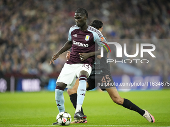 Amadou Onana defensive midfield of Aston Villa and Belgium and Aleksandar Pavlovic defensive midfield of Bayern Munich and Germany compete f...