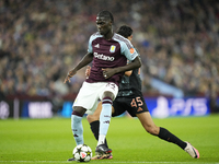 Amadou Onana defensive midfield of Aston Villa and Belgium and Aleksandar Pavlovic defensive midfield of Bayern Munich and Germany compete f...