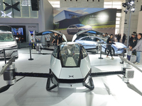 Visitors look at the XPENG AEROHT ''Traveler X2'' electric flying aircraft at the 2024 China (Tianjin) International Auto Show in Tianjin, C...