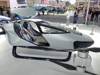 Visitors look at the XPENG AEROHT ''Traveler X2'' electric flying aircraft at the 2024 China (Tianjin) International Auto Show in Tianjin, C...