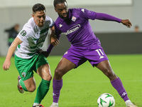 Jonathan Ikonè of ACF Fiorentina and Daniel Redmond of The New Saints ,battle for the ball during the Conference League match between ACF Fi...