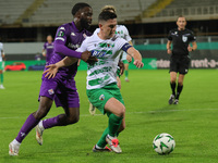 Jonathan Ikonè of ACF Fiorentina and Daniel Redmond of The New Saints ,battle for the ball during  the Conference League match between ACF F...