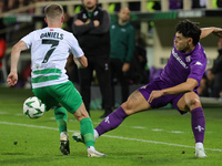 Riccardo Sottil of ACF Fiorentina and Joshua Daniels of The New Saints ,battle for the ball during  the Conference League match between ACF...