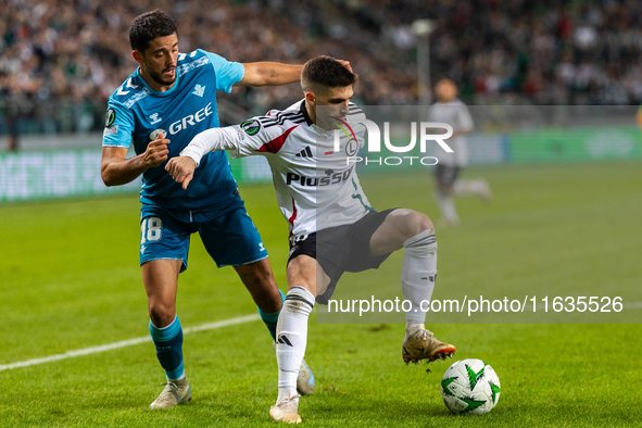 Pablo Fornalks and Ruben Vinagre are playing during UEFA Conference League match between Legia Warsaw and Real Betis in Warsaw Poland on 3 O...