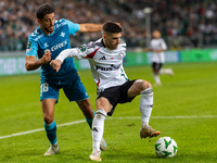 Pablo Fornalks and Ruben Vinagre are playing during UEFA Conference League match between Legia Warsaw and Real Betis in Warsaw Poland on 3 O...