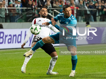 Luquinhas and Ezequiel Avila are playing during UEFA Conference League match between Legia Warsaw and Real Betis in Warsaw Poland on 3 Octob...