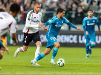 Tomas Pekhart and Pablo Fornals  are playing during UEFA Conference League match between Legia Warsaw and Real Betis in Warsaw Poland on 3 O...